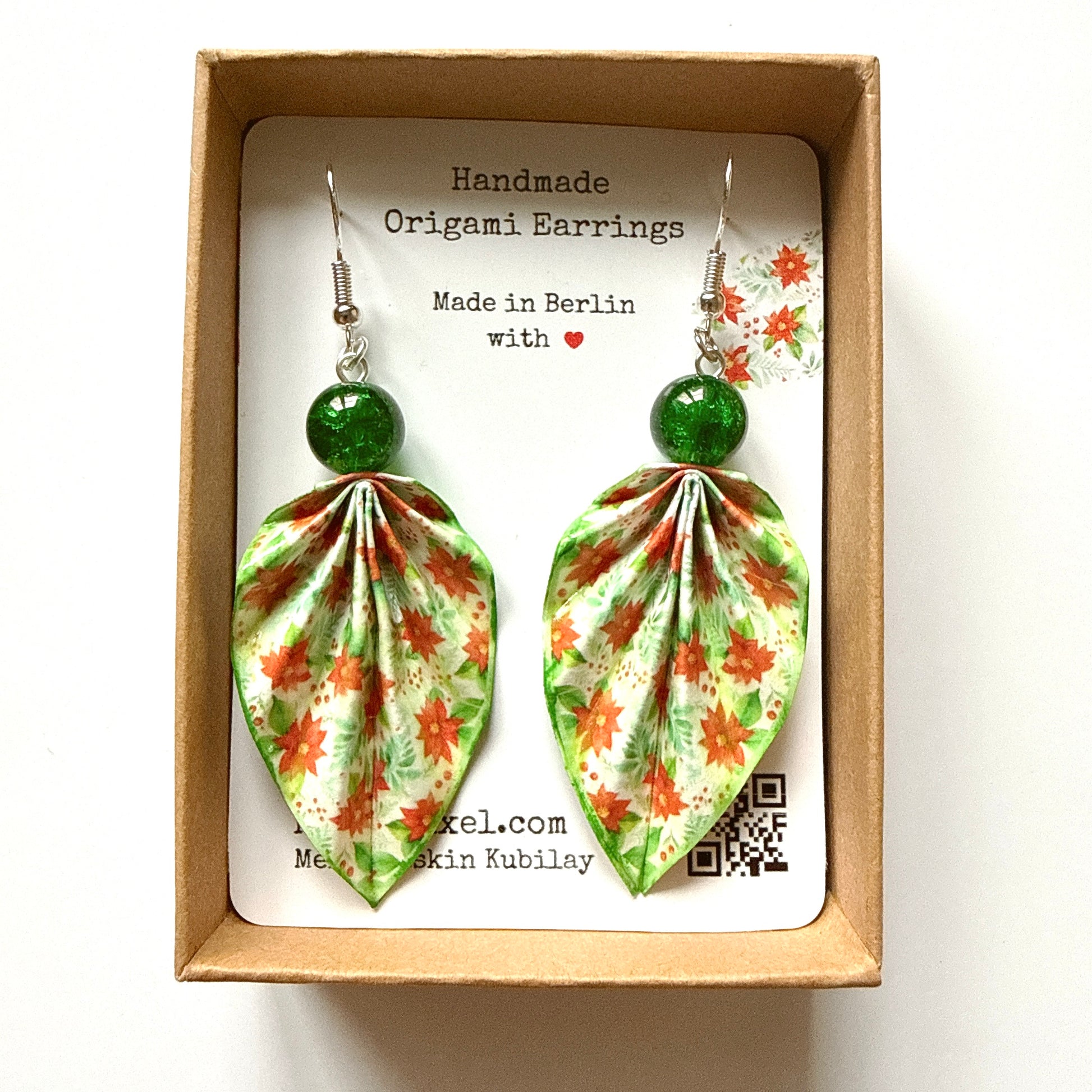Handmade origami earrings with floral design in a box, made in Berlin.